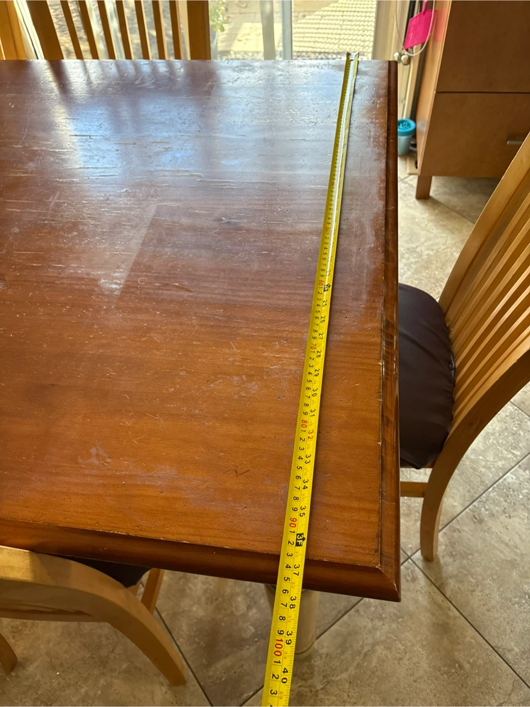 Wooden dining table with 6 chairs