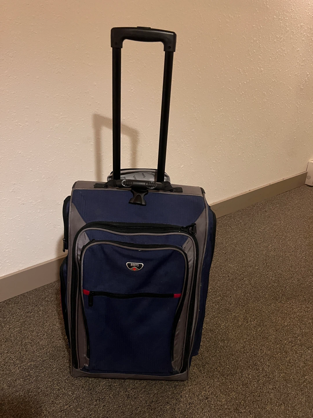 Roots Carry-on Rolling Suitcase