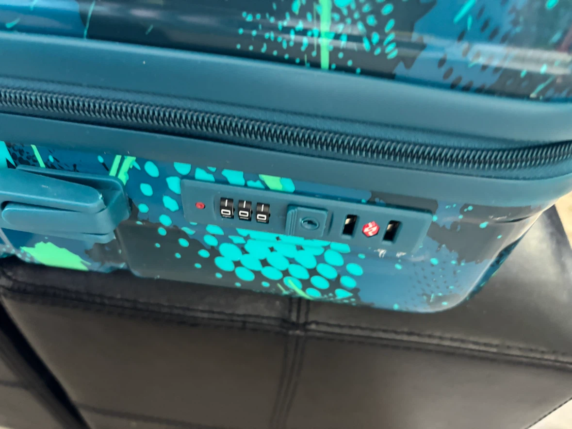 Skymate Teal Paint Splatter medium size Carry-On Suitcase