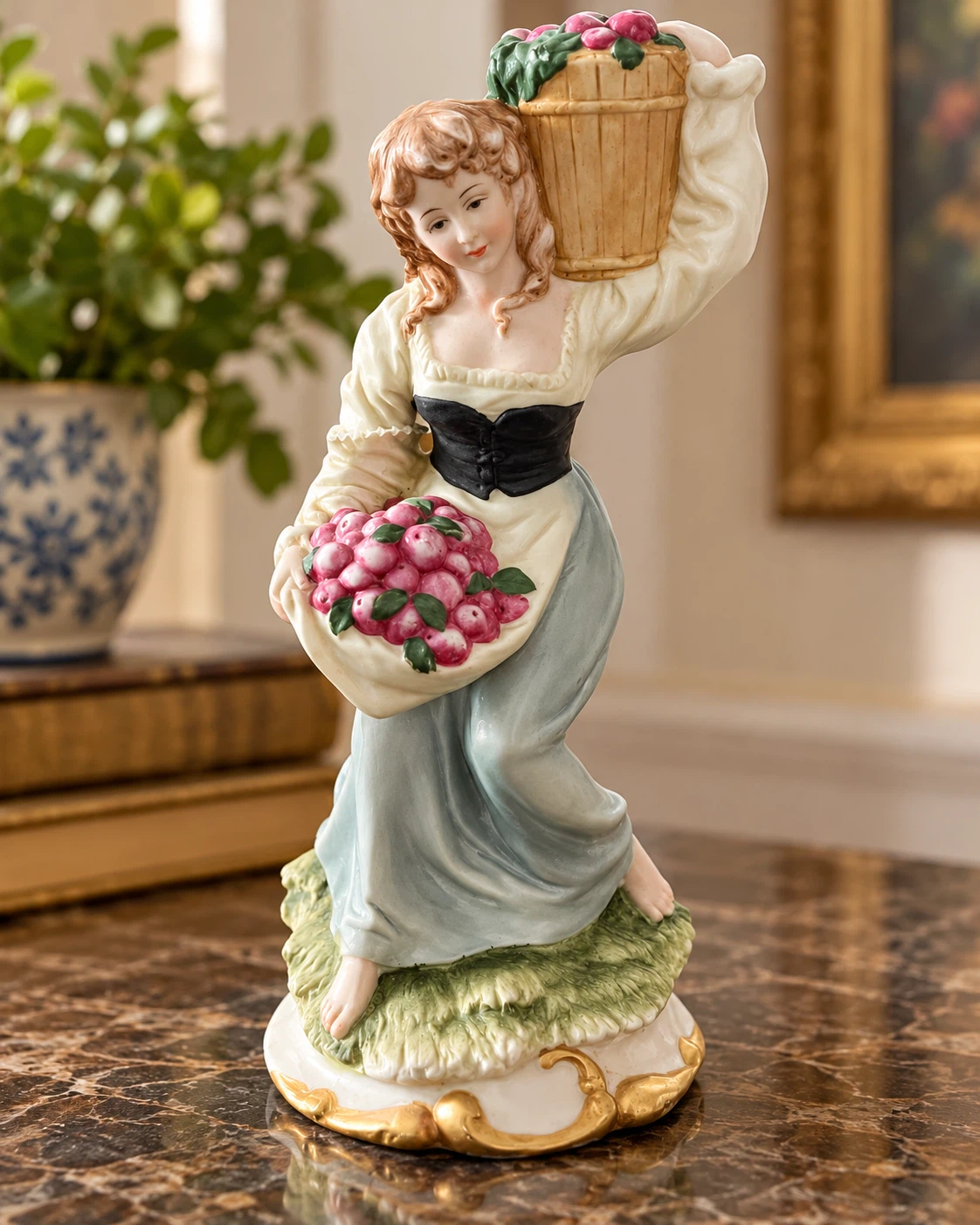 Porcelain Figurine of a Fruit Picker