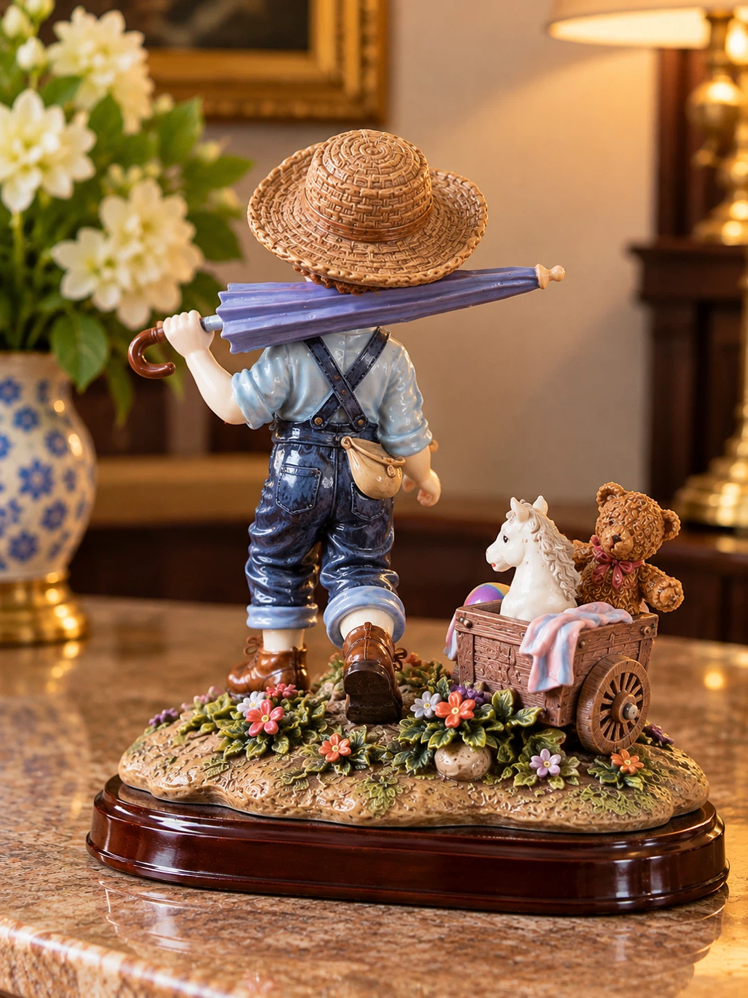 Decorative Porcelain Figurine of a Boy with Toy Wagon - photo 2