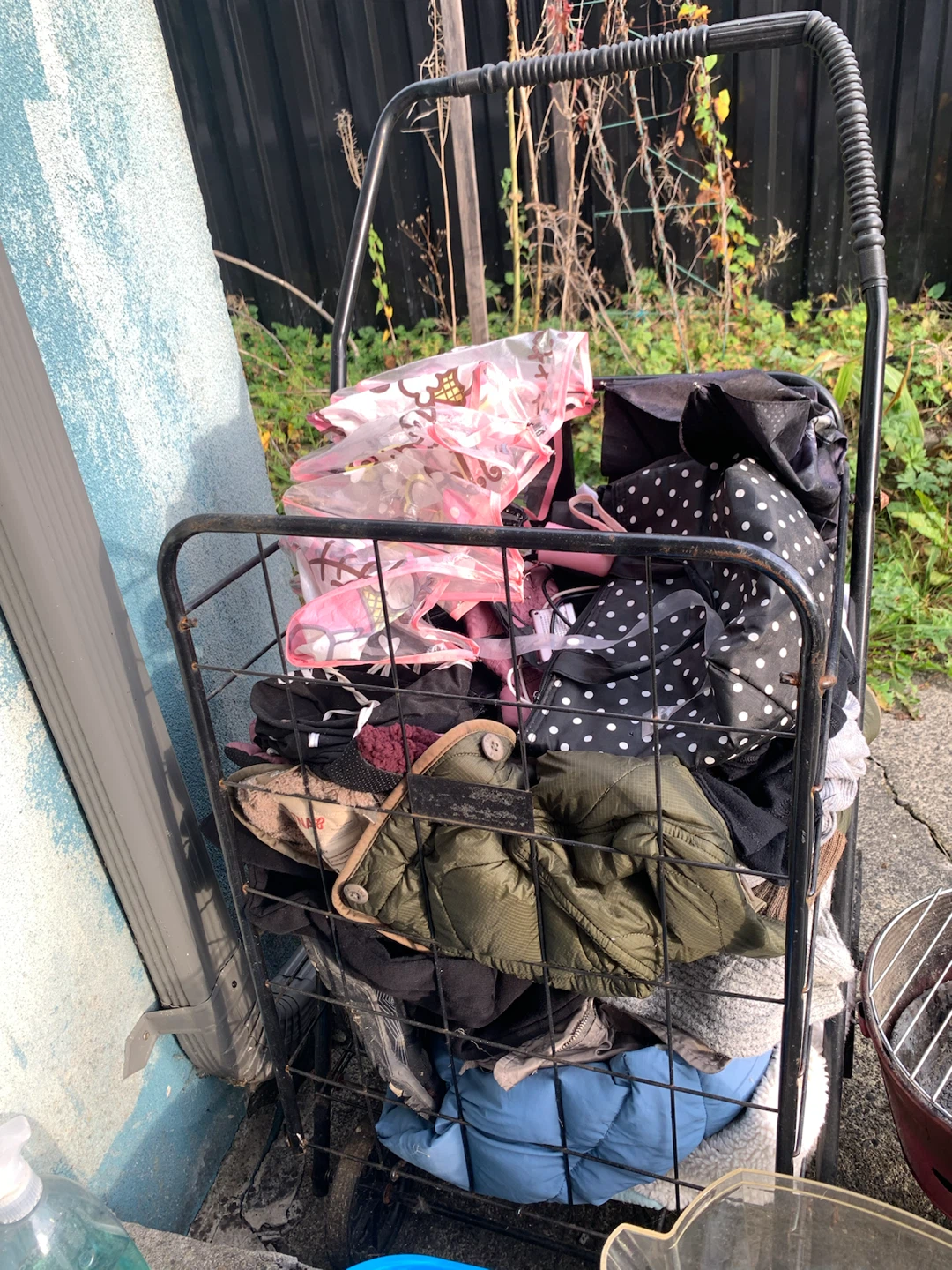 Metal Utility Shopping Cart with assorted woman clothes, etc. - photo 2