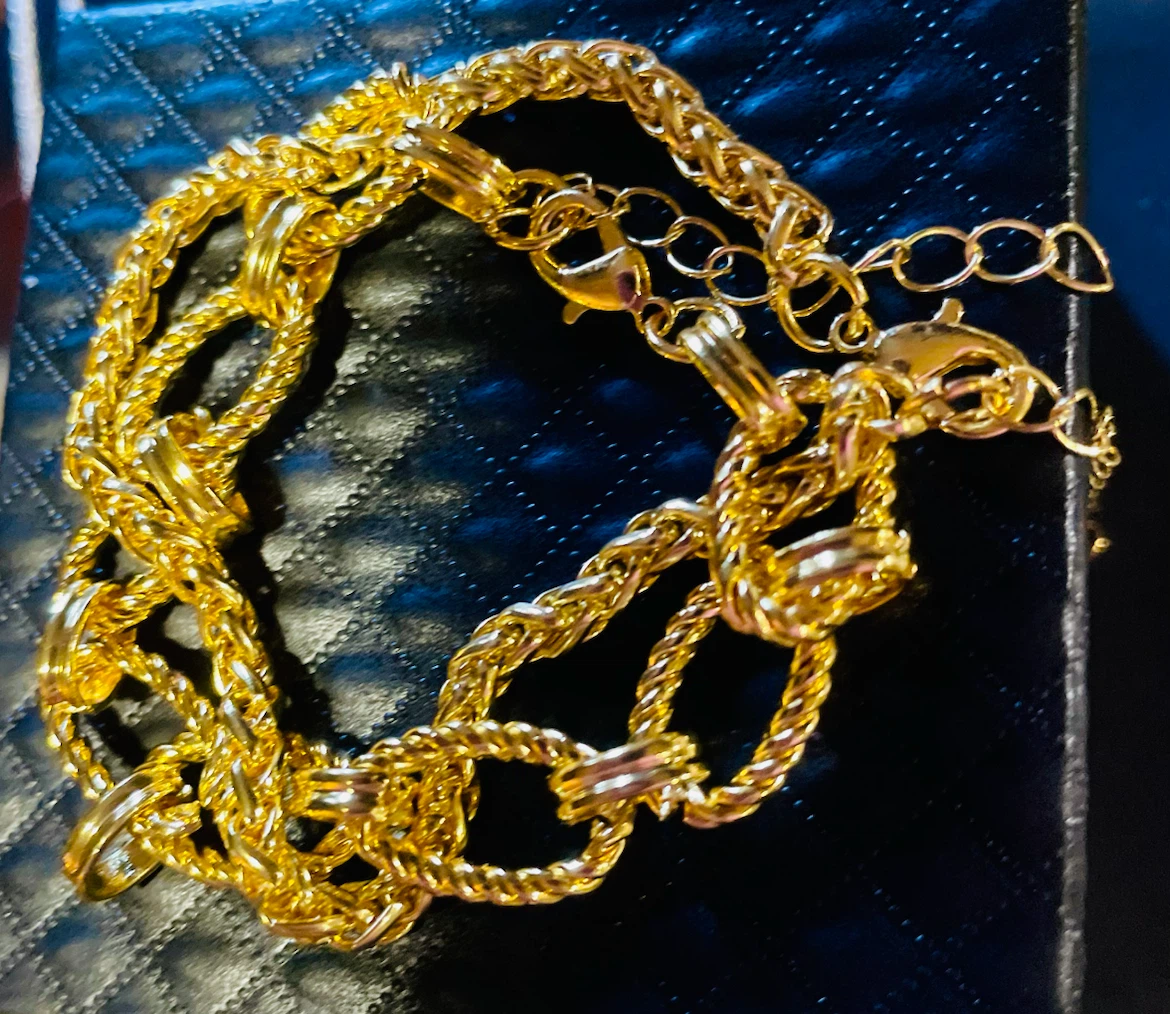 2 Gold-tone chain link bracelets