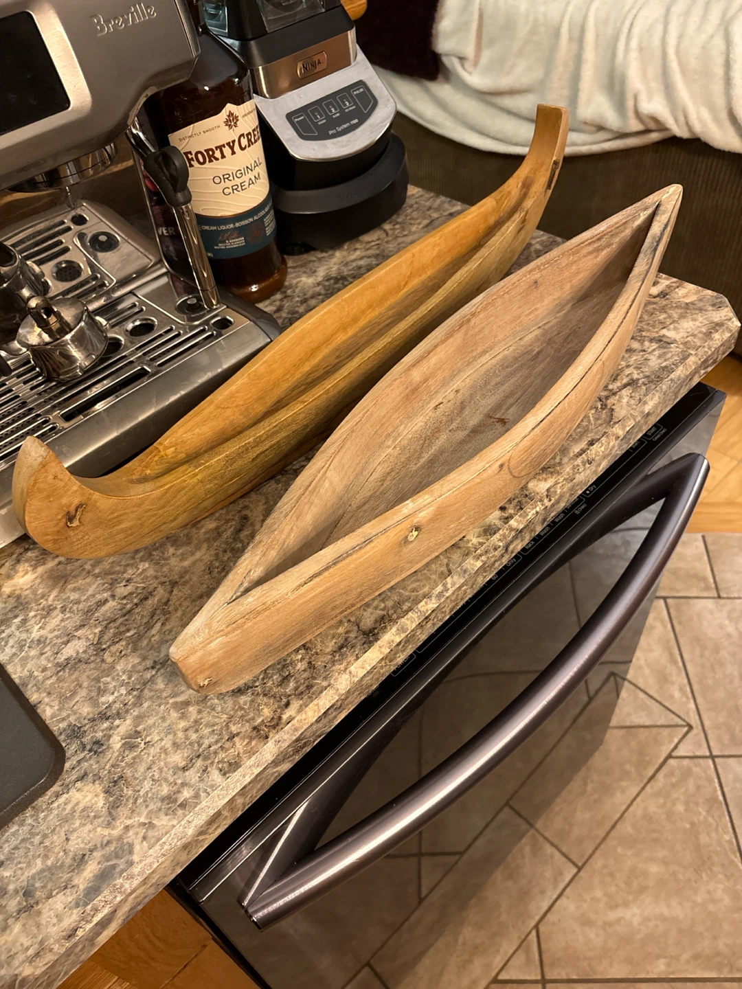 Two Wooden Canoe-Shaped Decorative Bowls