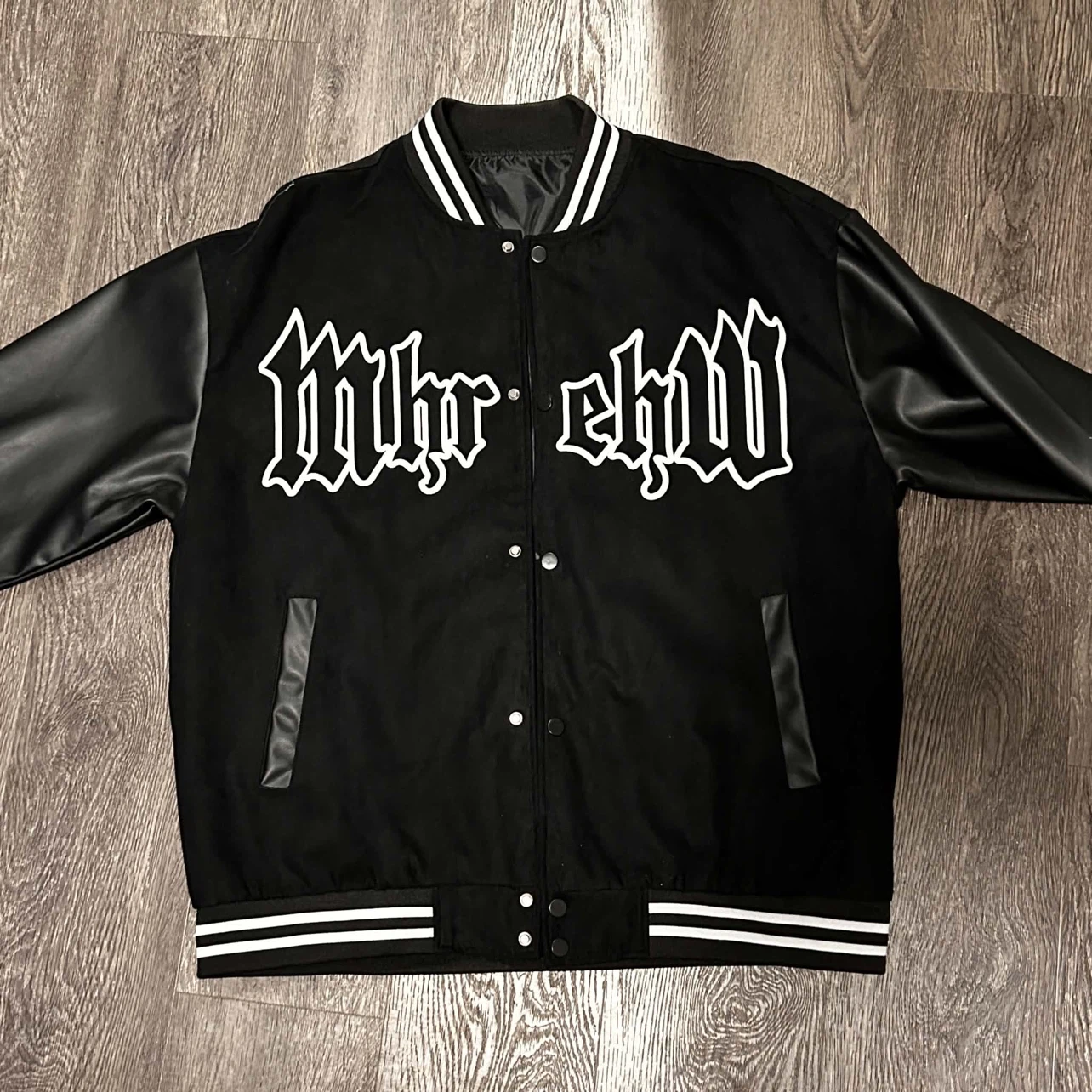 Black Varsity Bomber Jacket with Crescent Moon Design