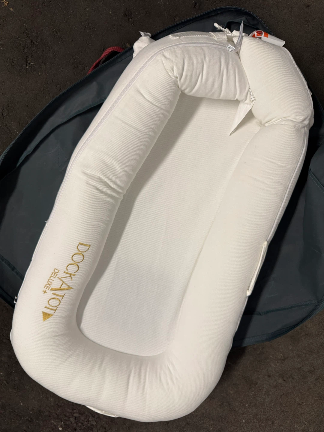 DockATot baby lounger