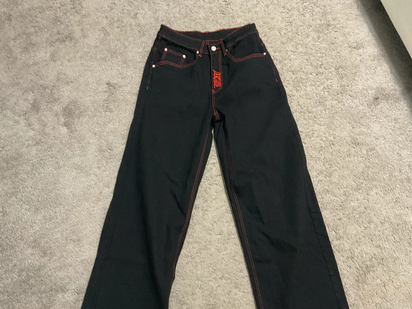 Heaven Can Wait black and red denim jeans