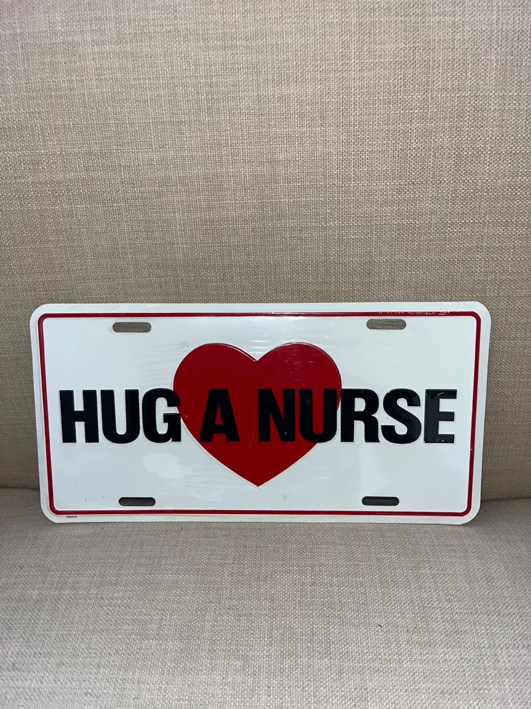 Hug A Nurse Decorative License Plate