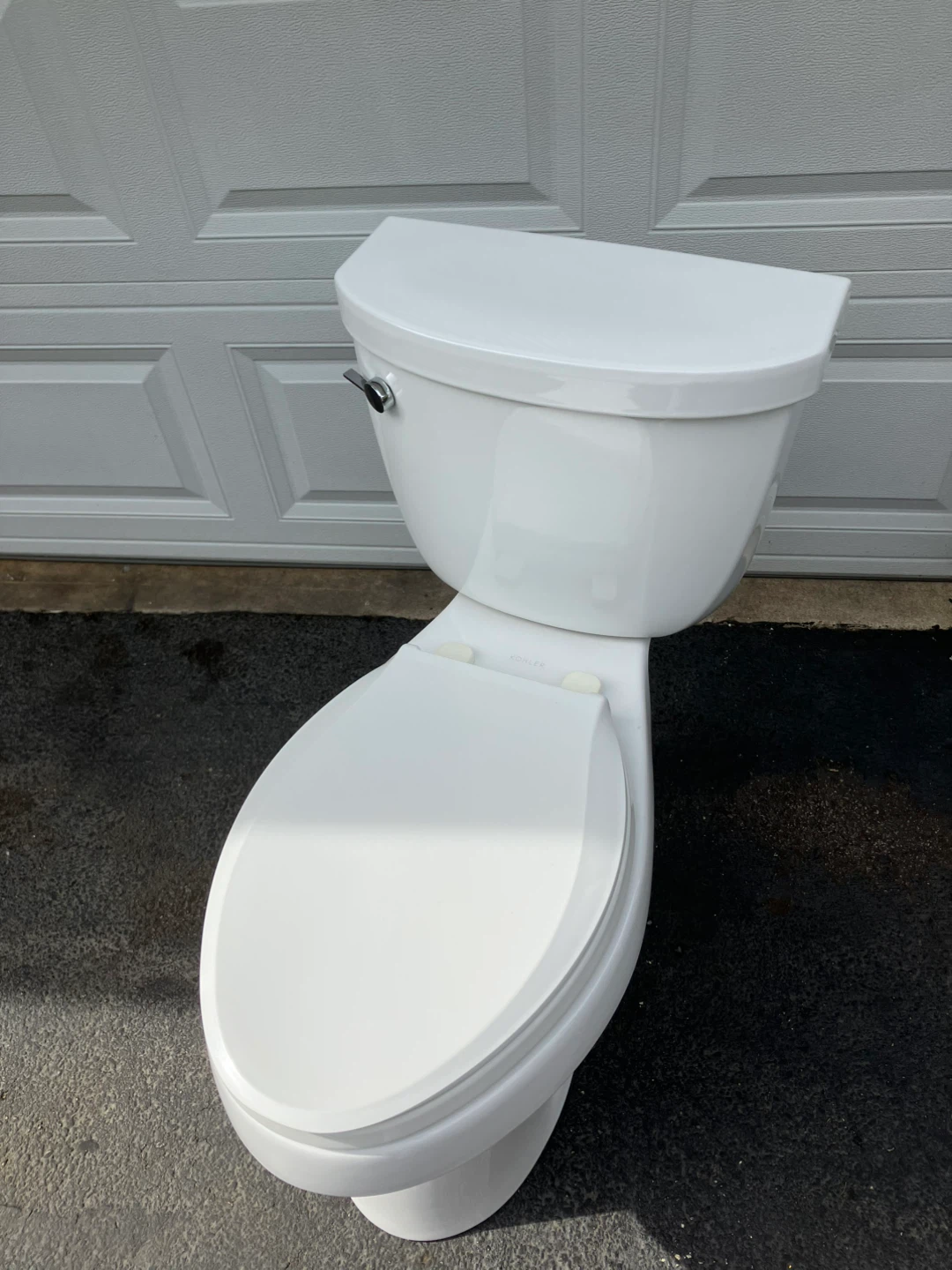 Kohler White Toilet. CIMORRON