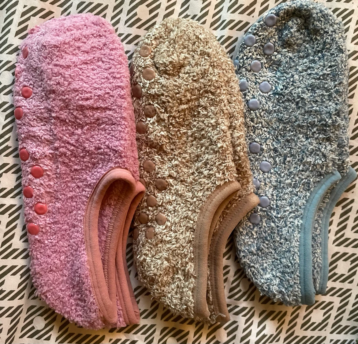 Three pairs of fuzzy grip socks