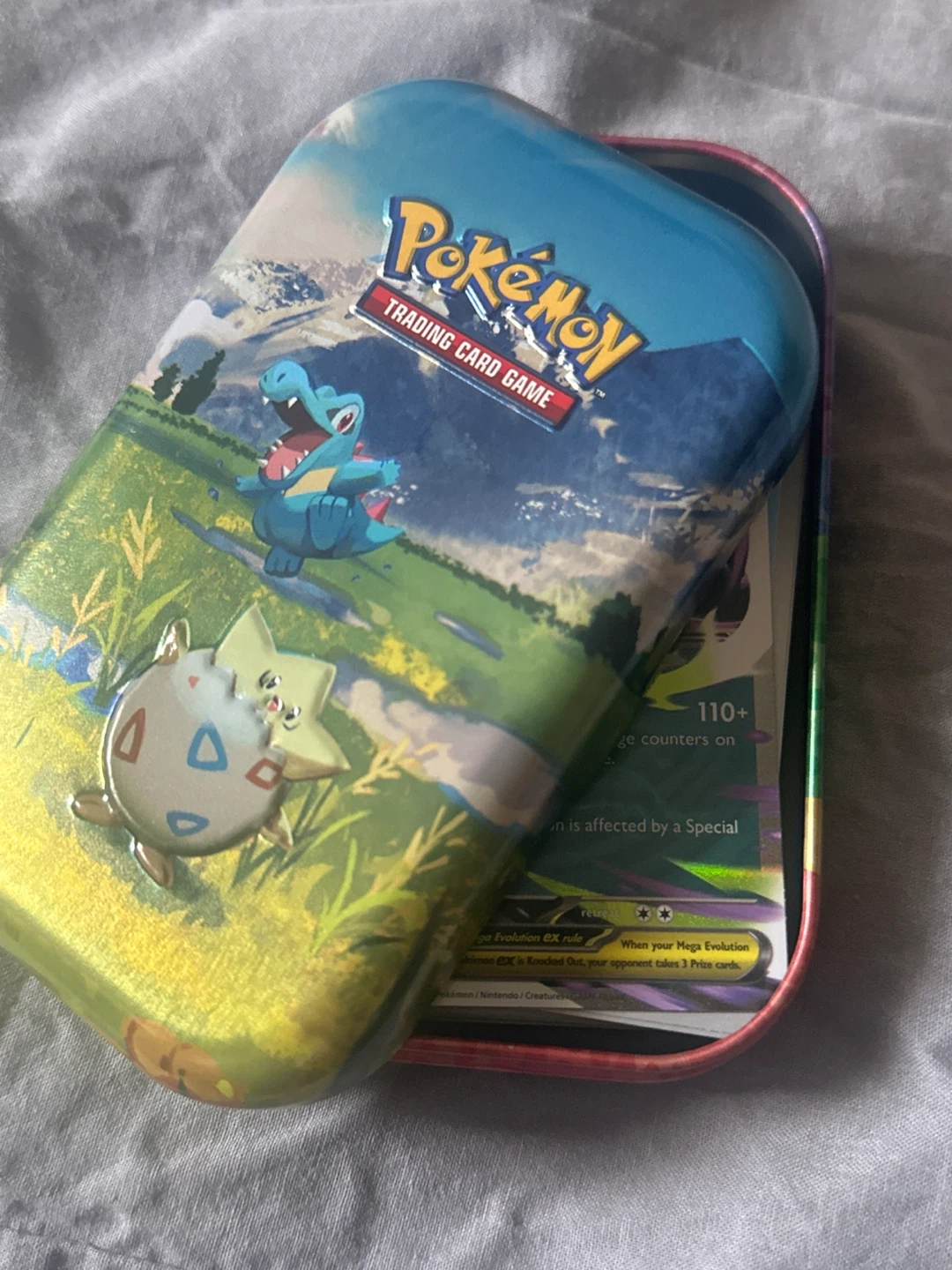 Pokemon TCG random bulk in a mini tin