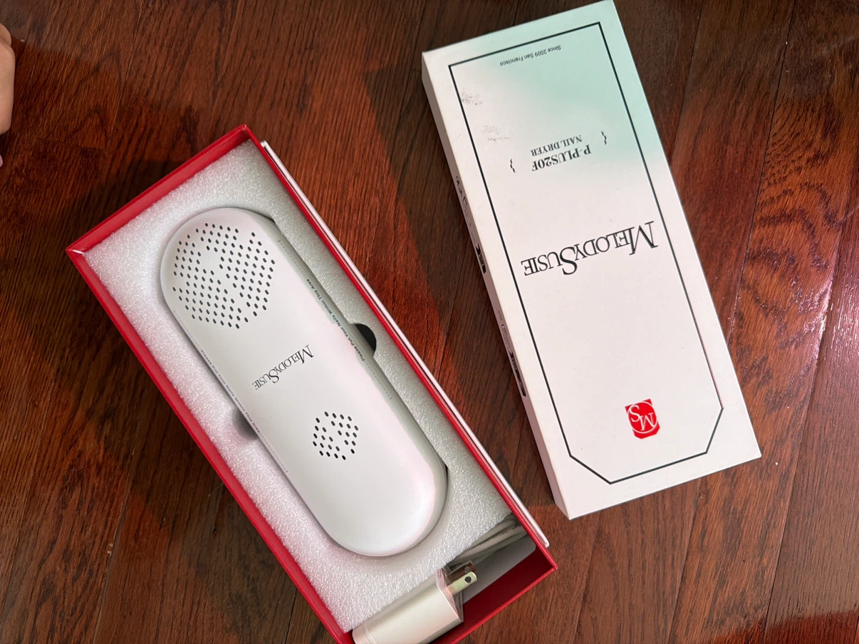 Melodie Susie compact UV gel nail lamp