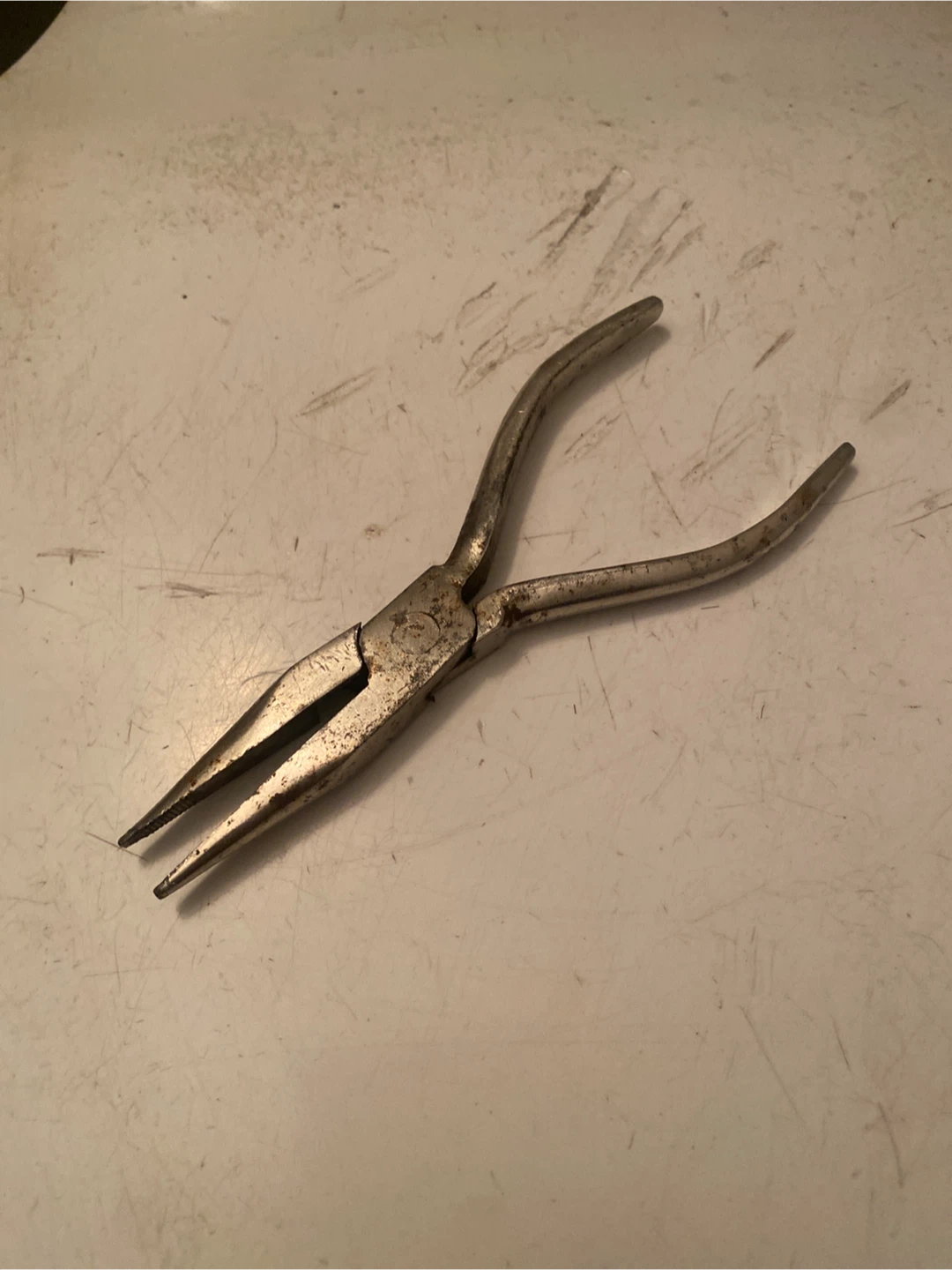 Metal needle-nose pliers
