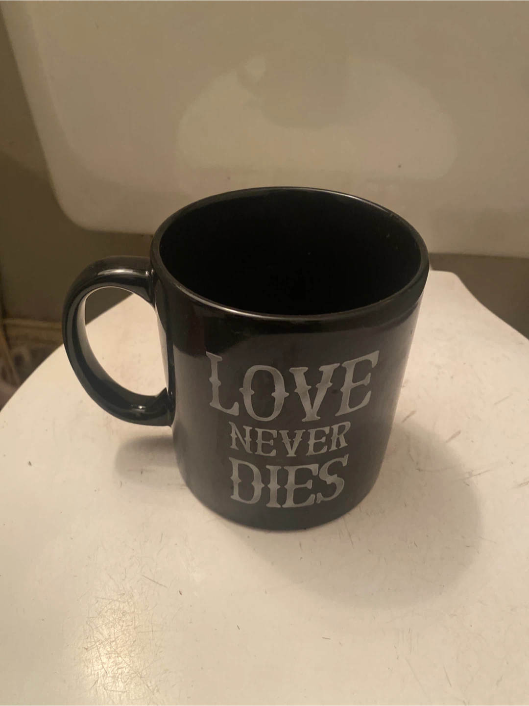 Love Never Dies Black Mug