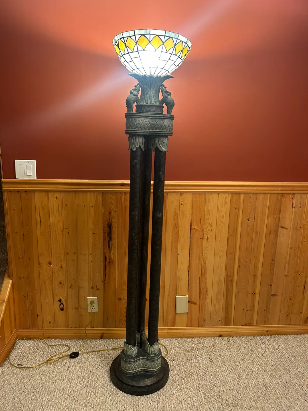 A beautiful Tiffany Style stained glass torchiere floor lamp