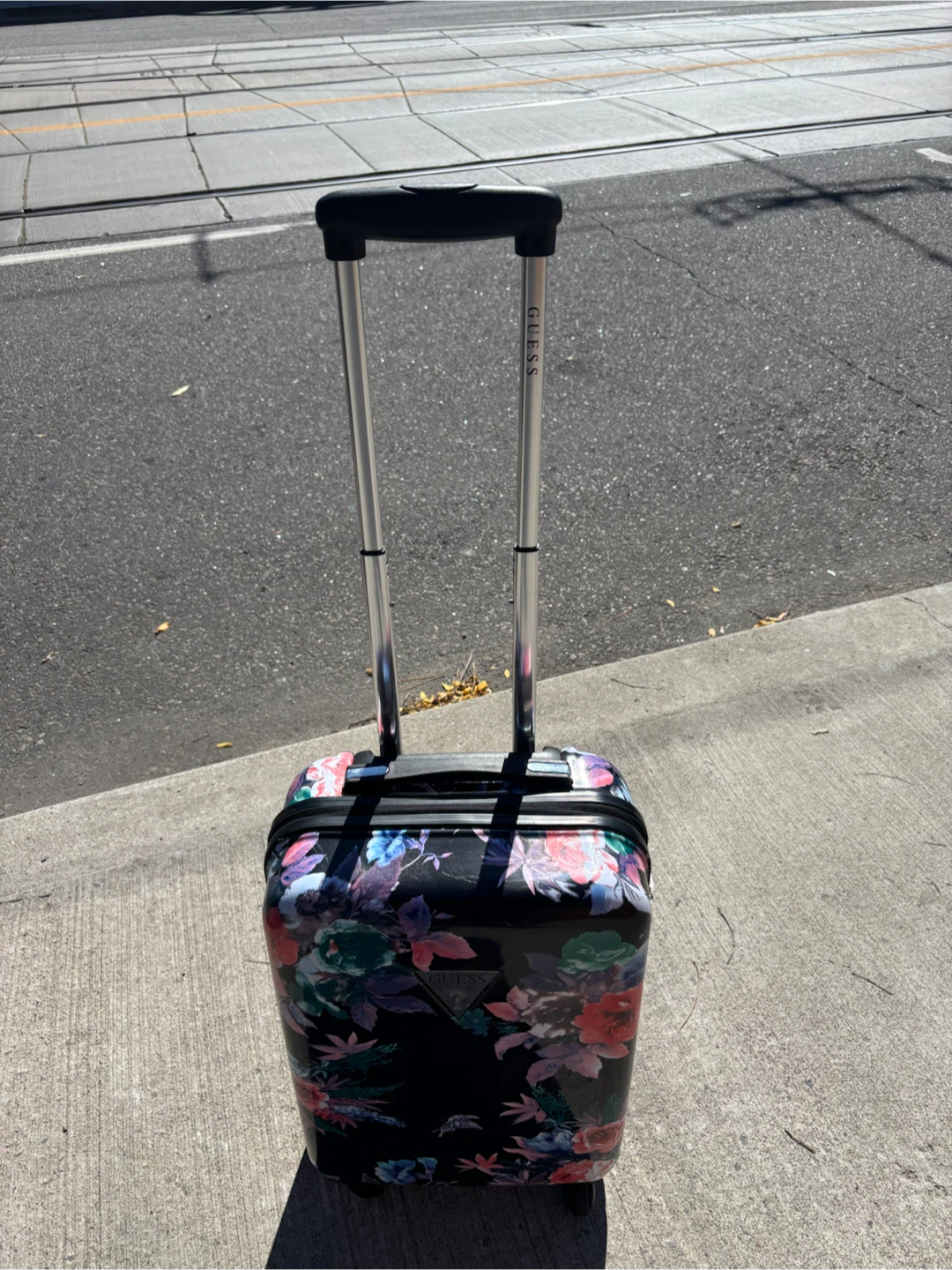 Guess floral hard-shell carry-on suitcase