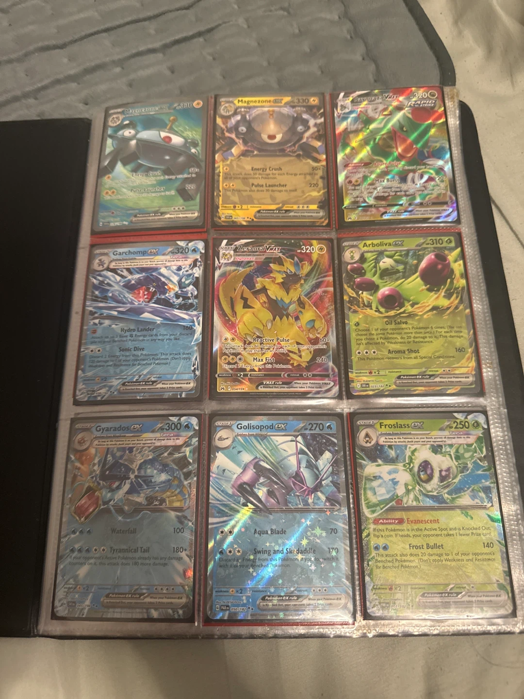 Assorted Pokemon Trading Card Collection with Binder