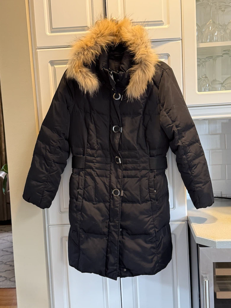 Black winter puffer parka with faux fur hood