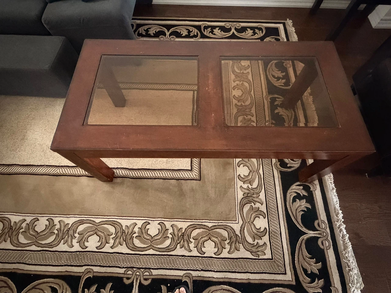 Dark wood coffee table with glass inserts