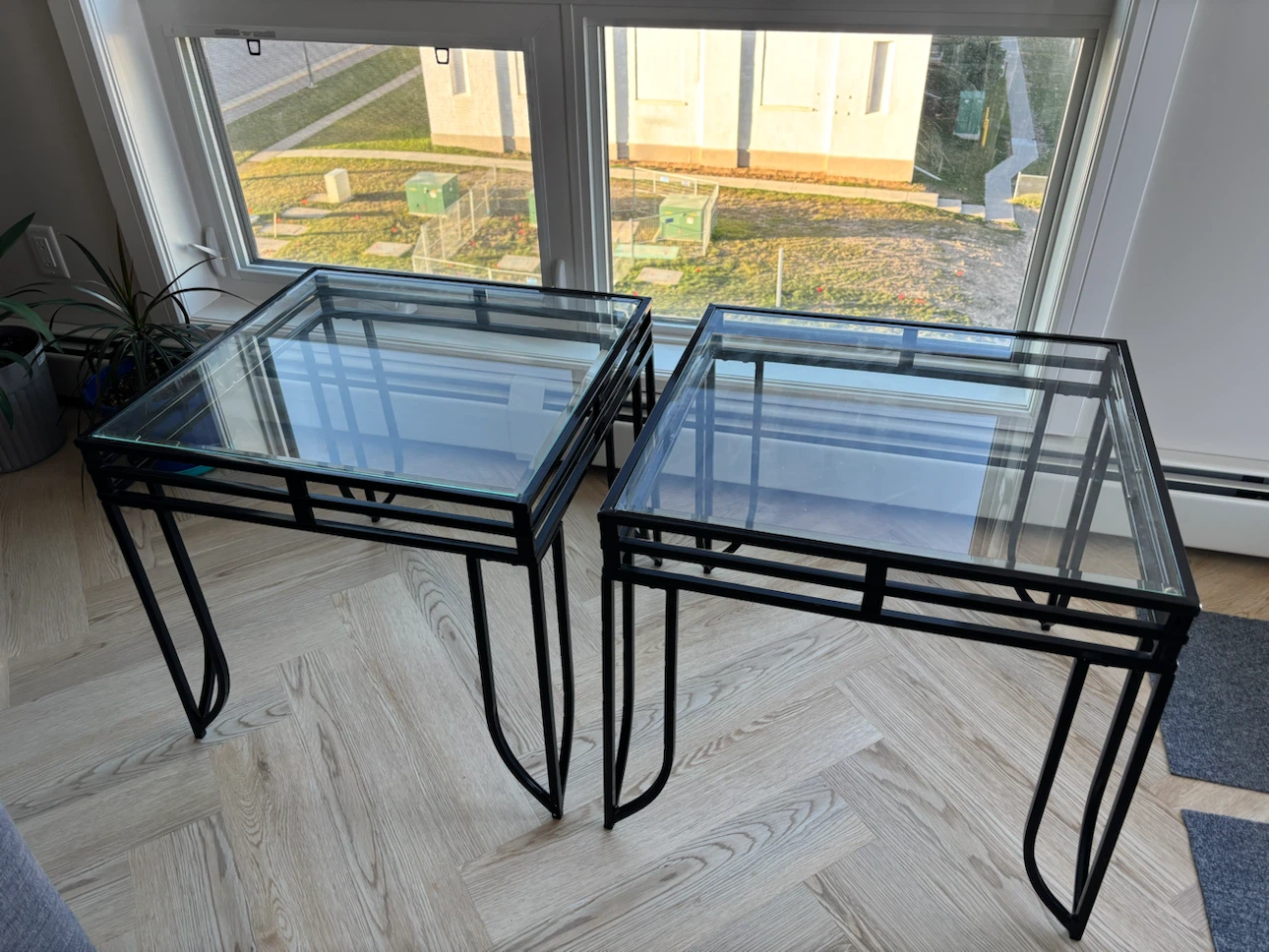 Set of Two Black Metal and Glass Side Tables