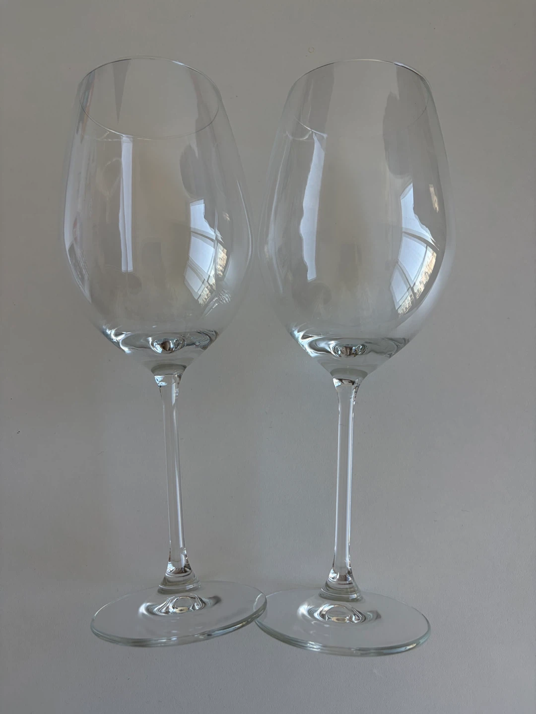 Two clear wine glasses