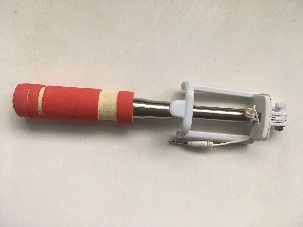 Preowned Mini Selfie Stick Camera Taking Pictures