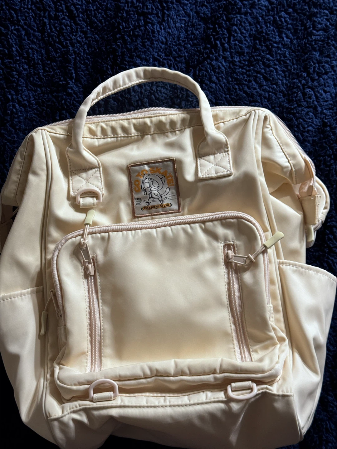 Cream Coloured LXH Skateboard Backpack