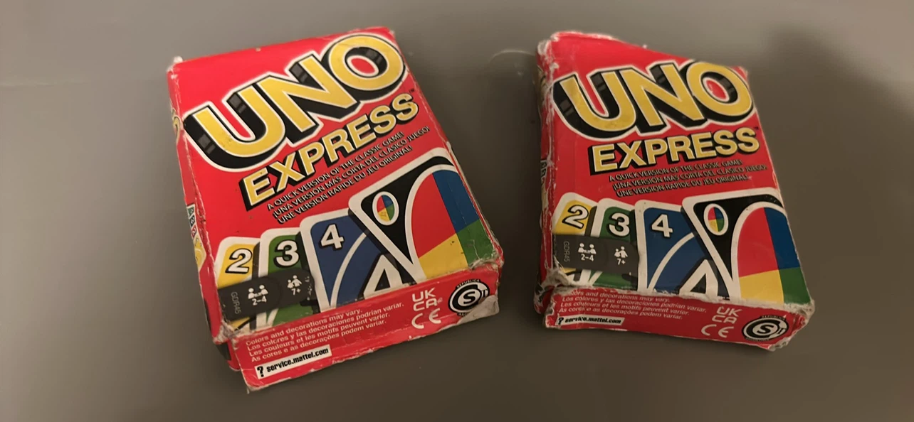 Two decks of Mattel UNO Express card games