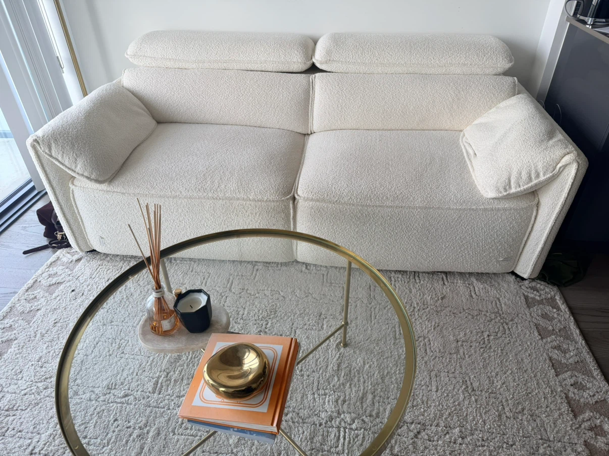 Structure Off-White Bouclé Sofa bed and ikea coffee table