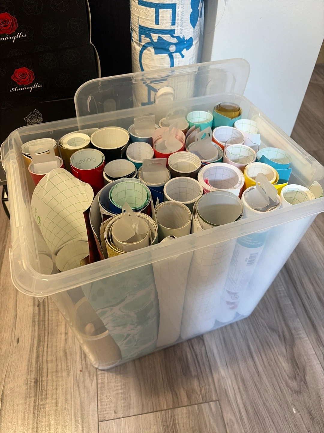 Assorted Craft Vinyl Rolls in Storage Bin