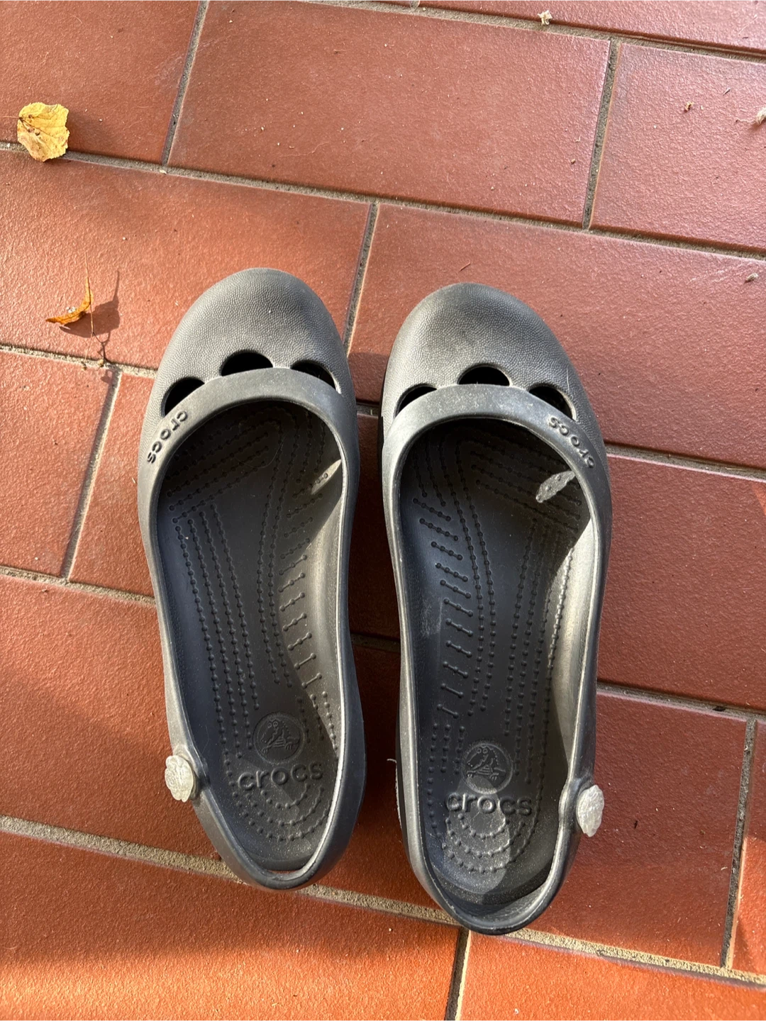 Black Crocs flats