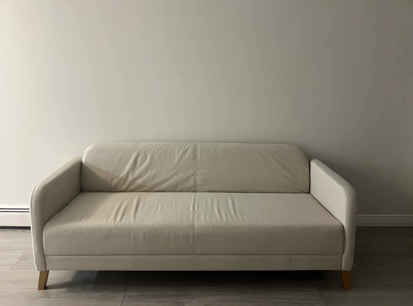 Off-white three-seater sofa IKEA