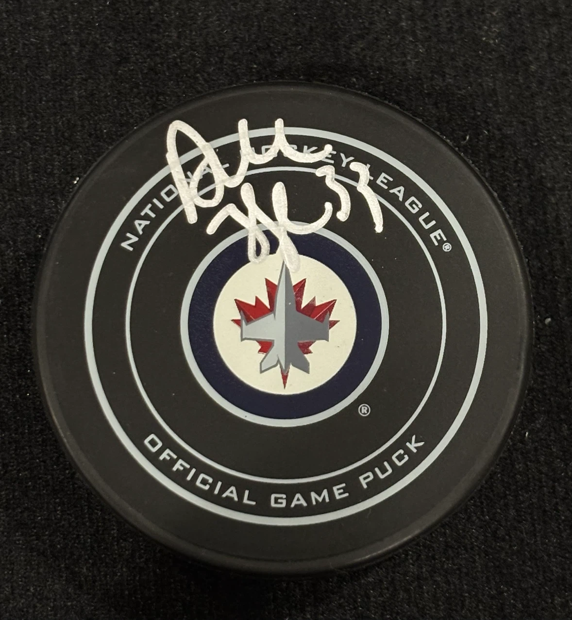 Dustin Byfuglien Autographed NHL Centennial Puck with COA