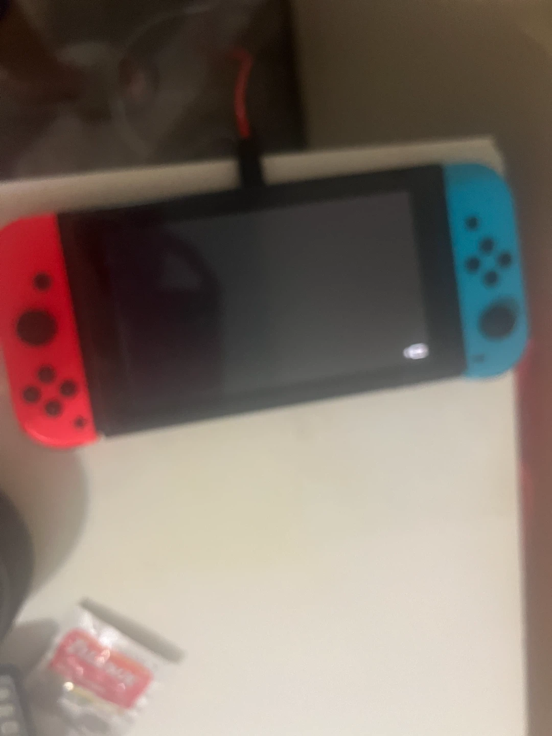 Nintendo Switch Console with Neon Controllers