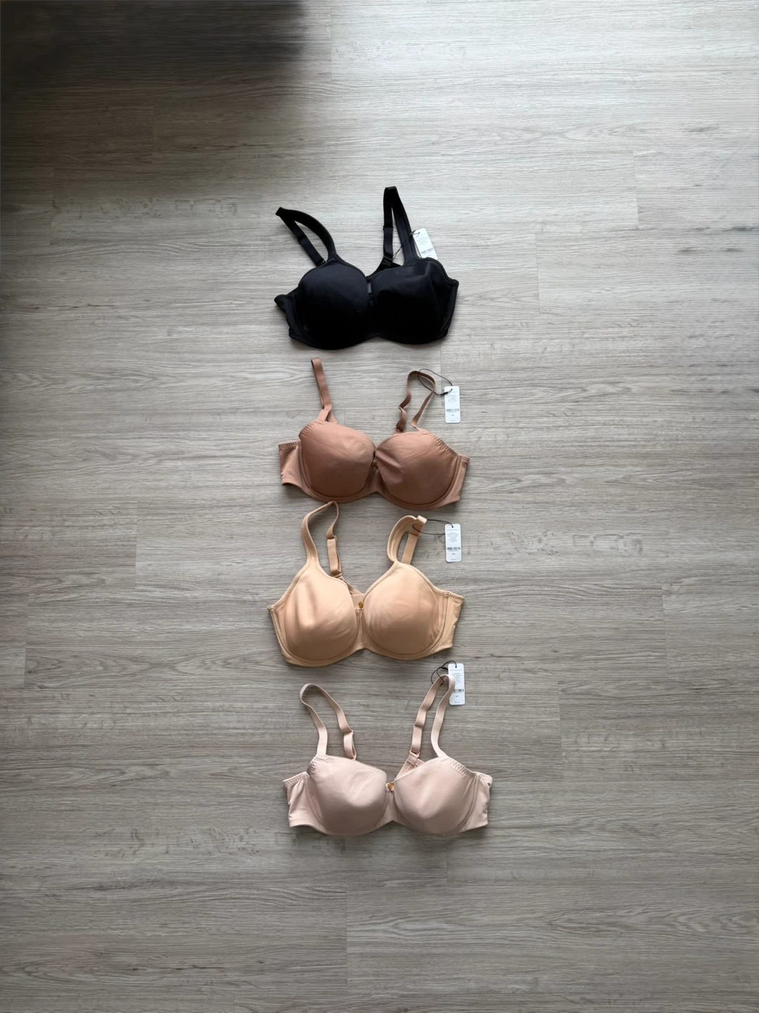 4 38D UNDERSTANCE black, brown, light brown, and beige bras with