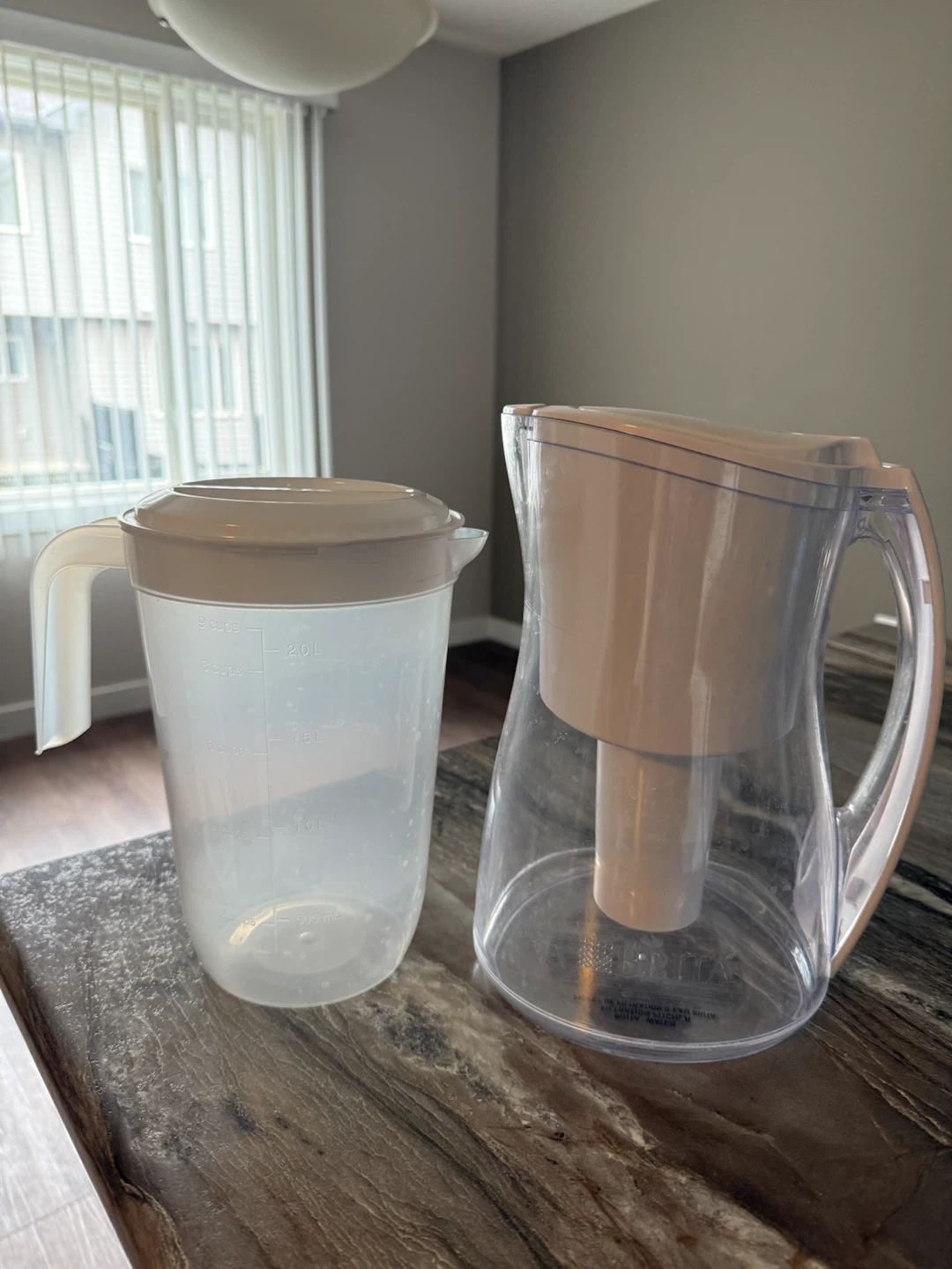 Water Filter Pitcher with a free clear plastic pitcher