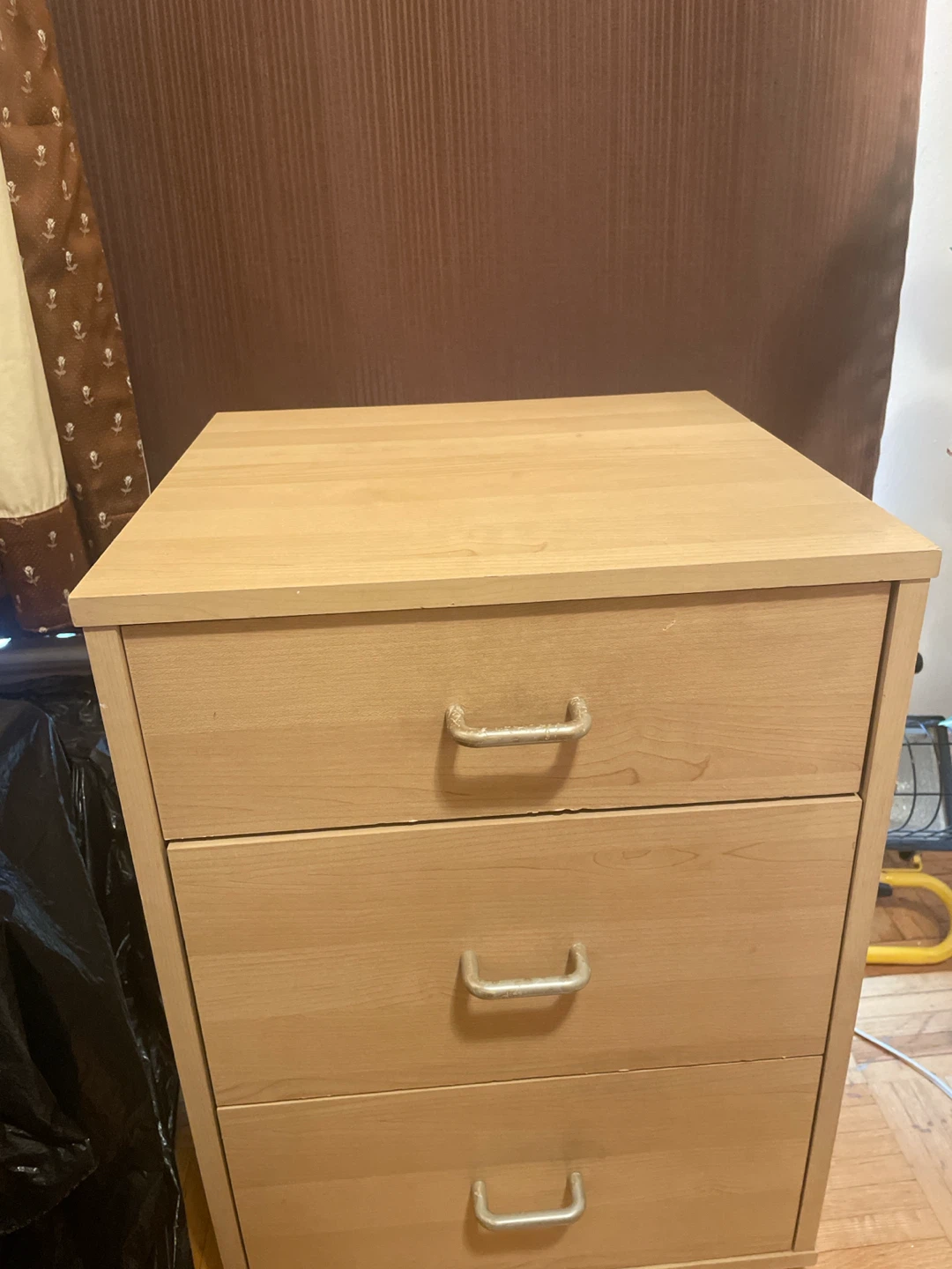 Three-drawer wood bedside table