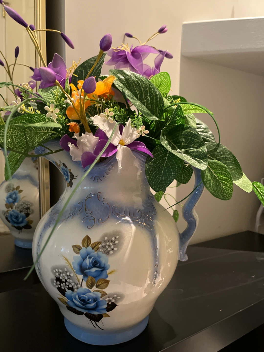 Decorative Ceramic Pitcher with Floral Design