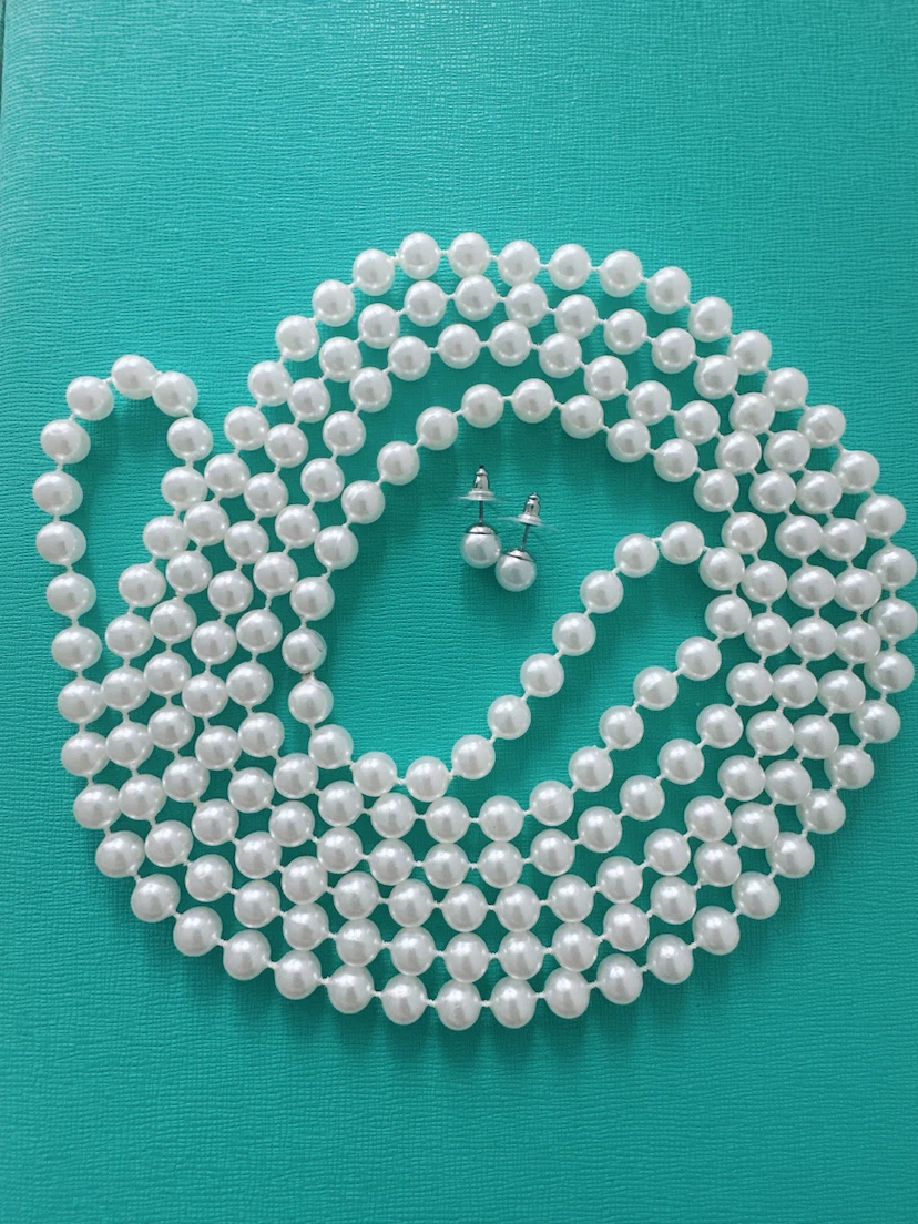 White faux pearl necklace and earring set