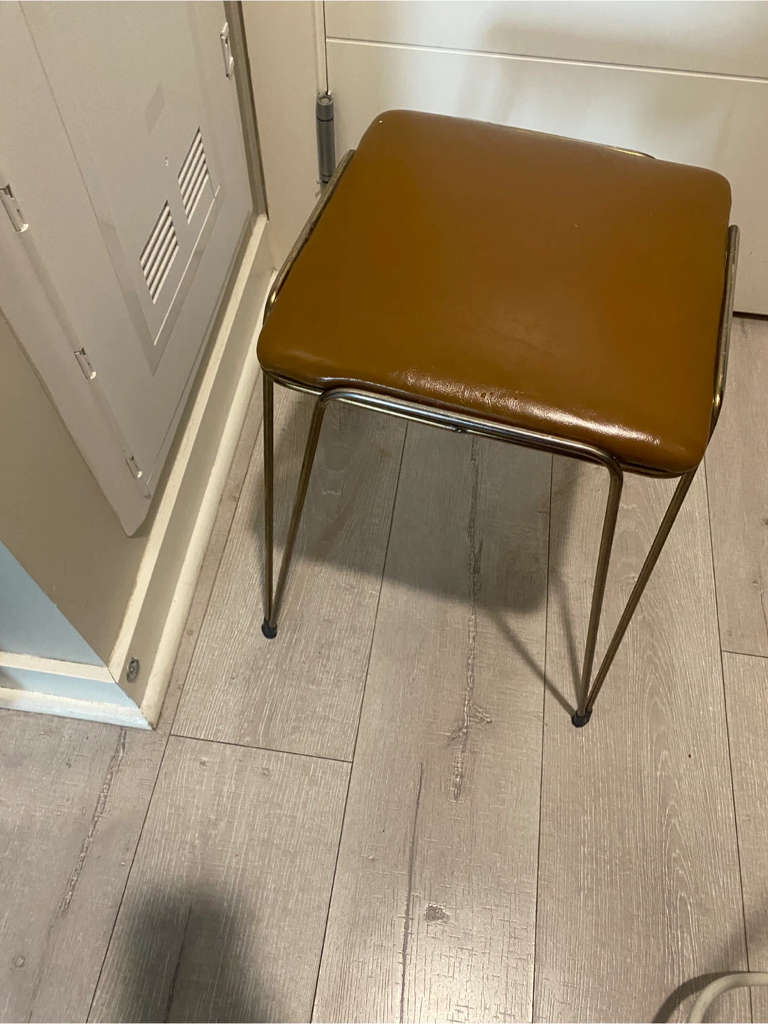 Vintage style brown vinyl stool