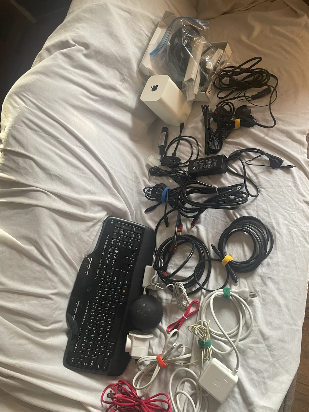 Logitech Keyboard, Amazon Echo Dot, and Various Cables