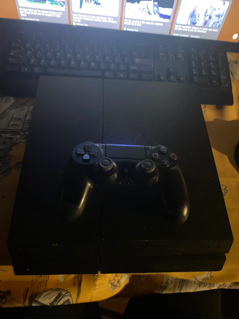 Sony PlayStation 4 Console with Controller