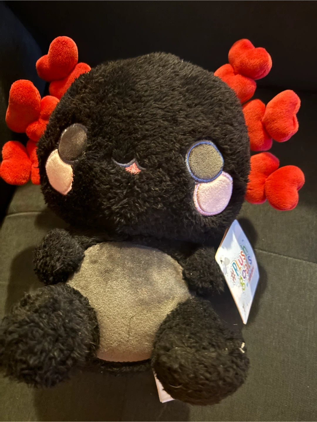 Black and red axolotl plushie