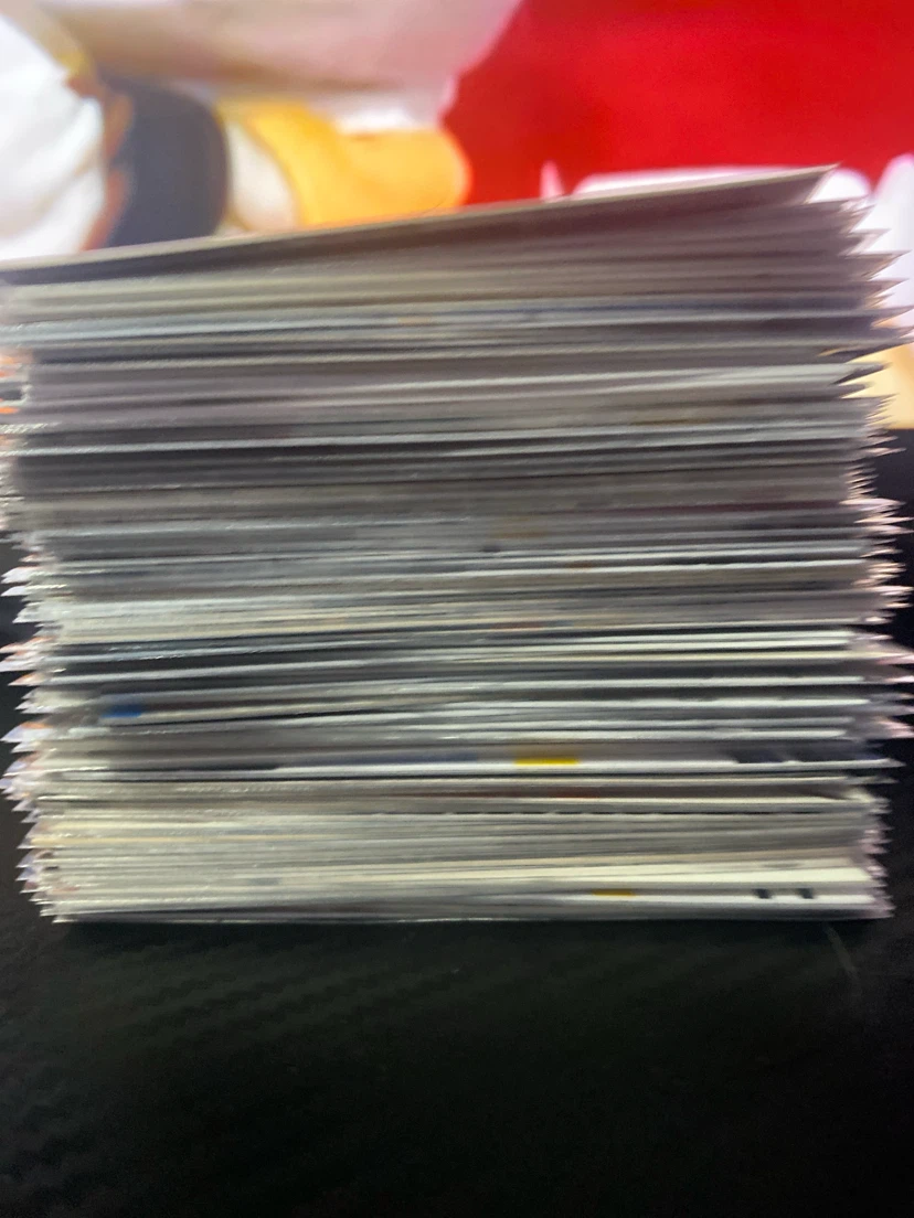 Stack of Assorted Trading Cards