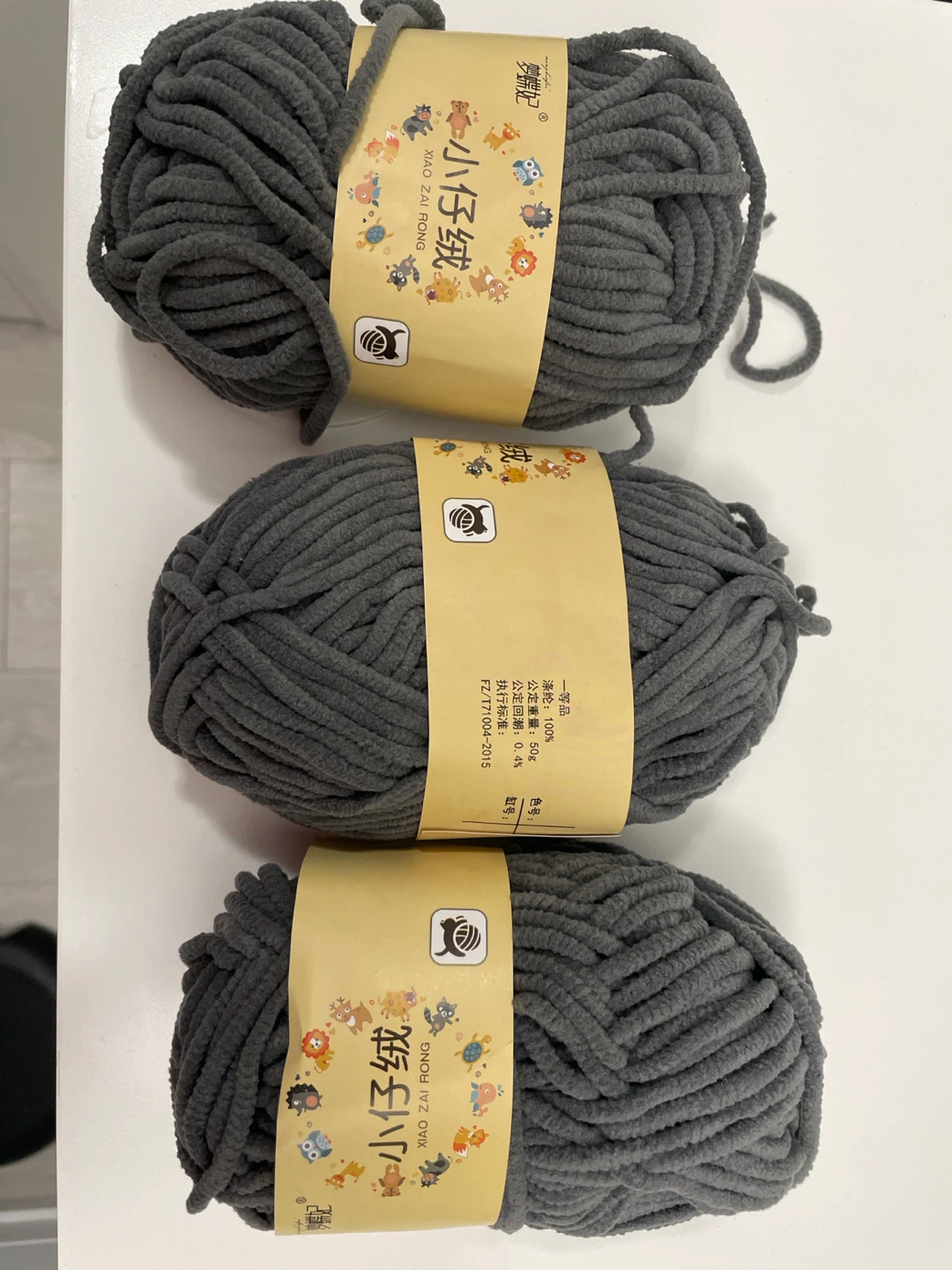 Three Skeins of Grey Plush Yarn