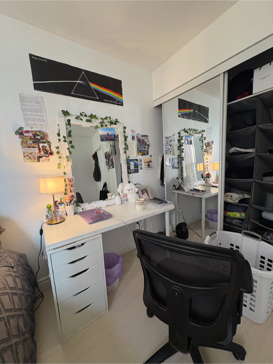 White IKEA desk with a wood-based tabletop and a metal leg