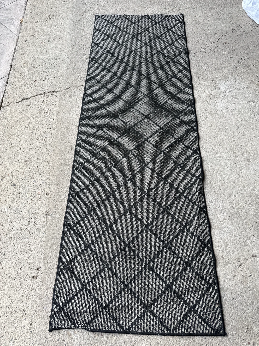Black and white diamond pattern runner rug