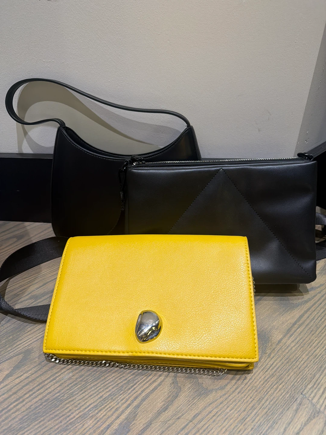Set of three assorted handbags