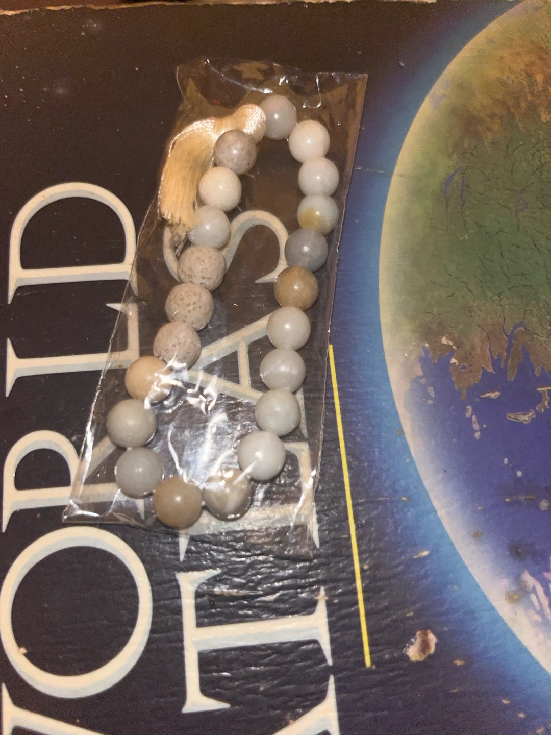 Stone bead bracelet with tassel