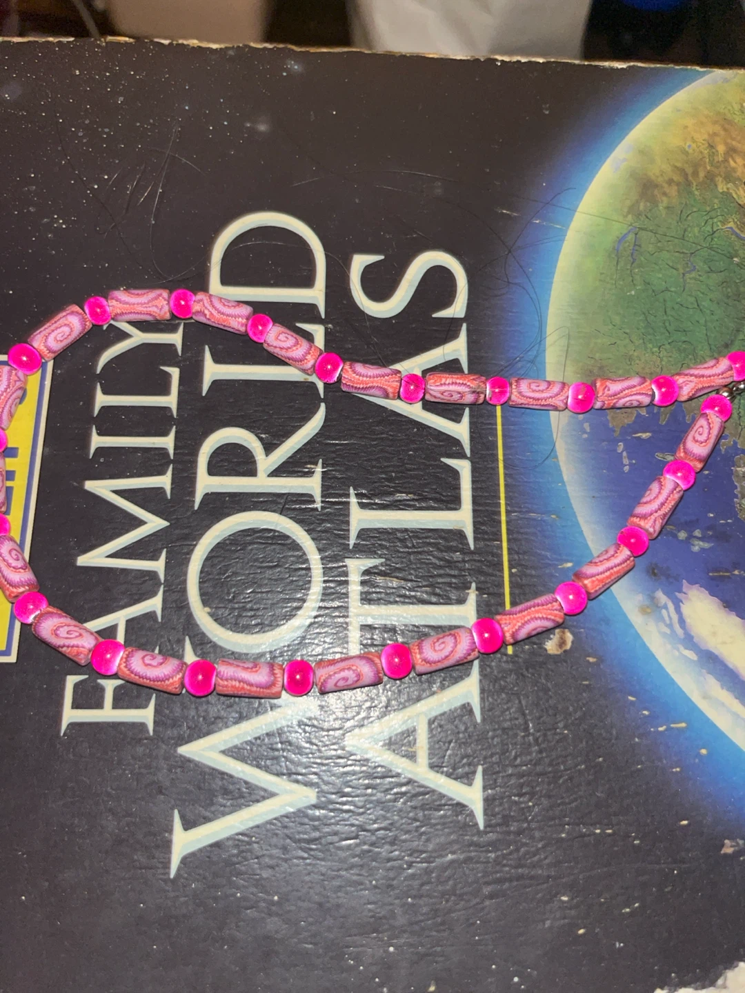 Pink and patterned bead necklace